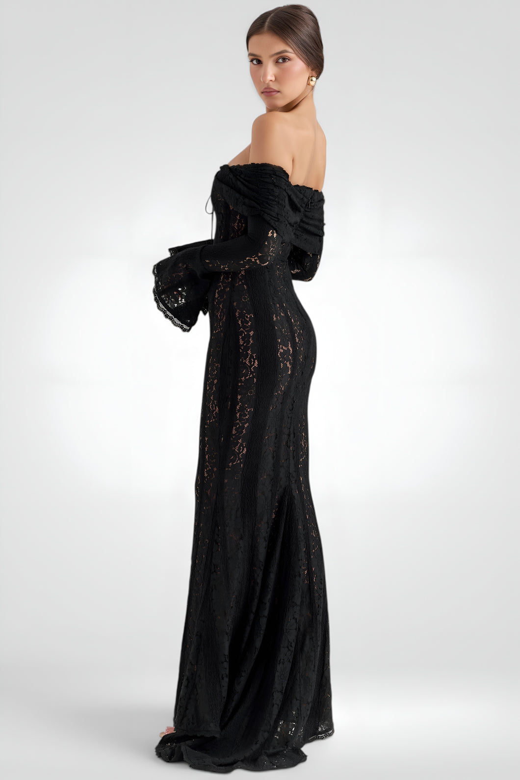 Black off-shoulder evening gown with lace details on a white background
