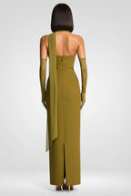 Green evening gown with a slit on a white background