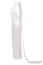 White dress with a long slit on a white background