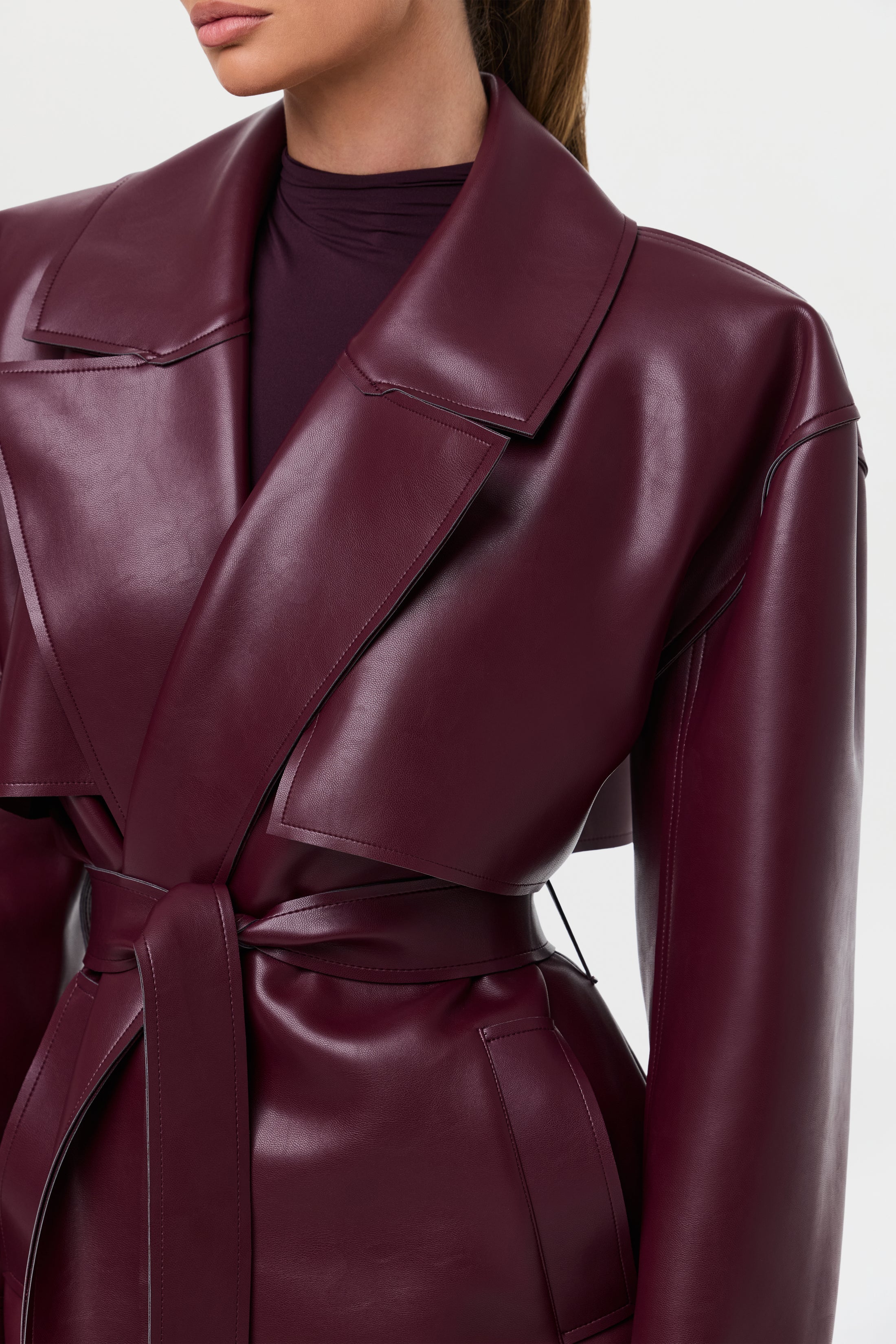 Plum Gloss Belted Trench Coat – Luxe PU Leather Longline Statement Outerwear