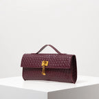 Woven Burgundy Baguette Clutch with Gold Lock