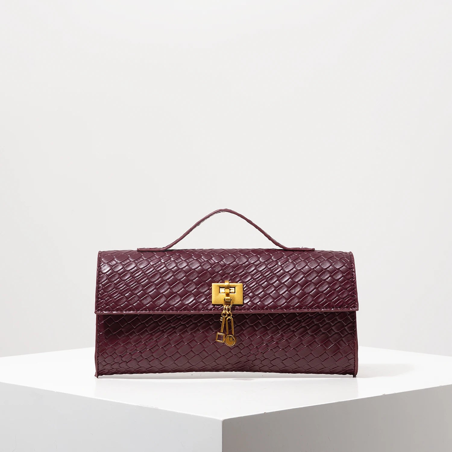 Woven Burgundy Baguette Clutch with Gold Lock