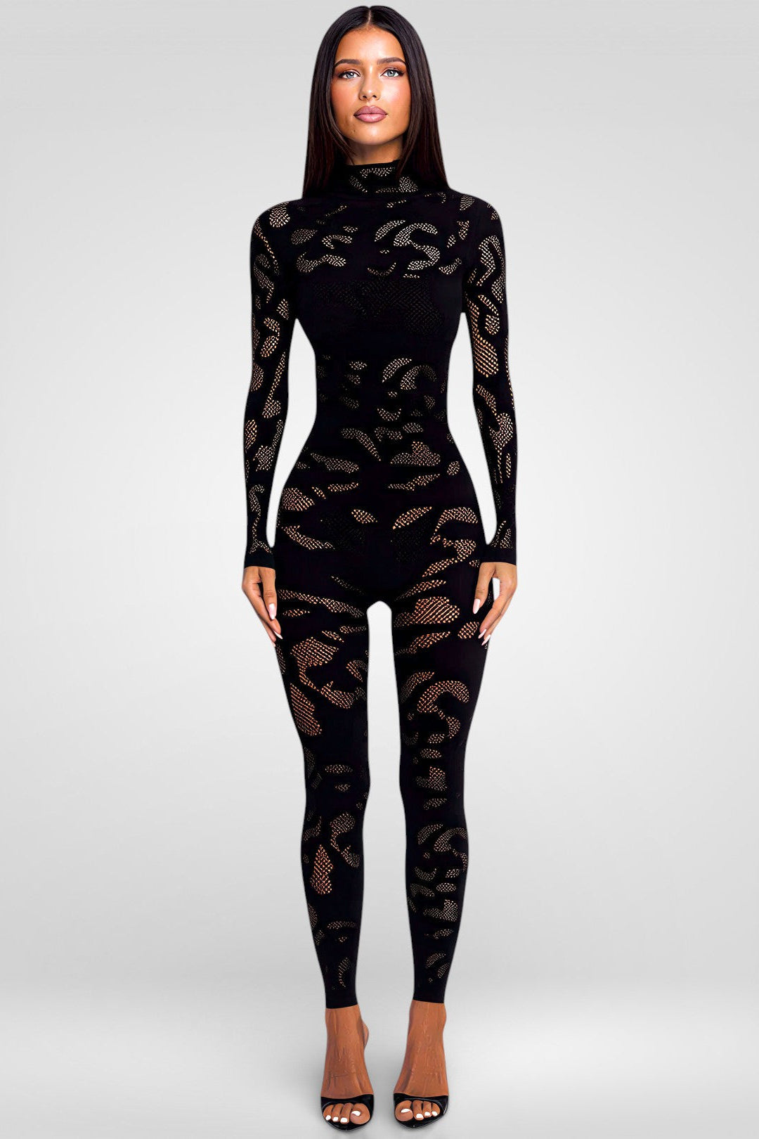 Black fishnet bodysuit worn by a model on a white background