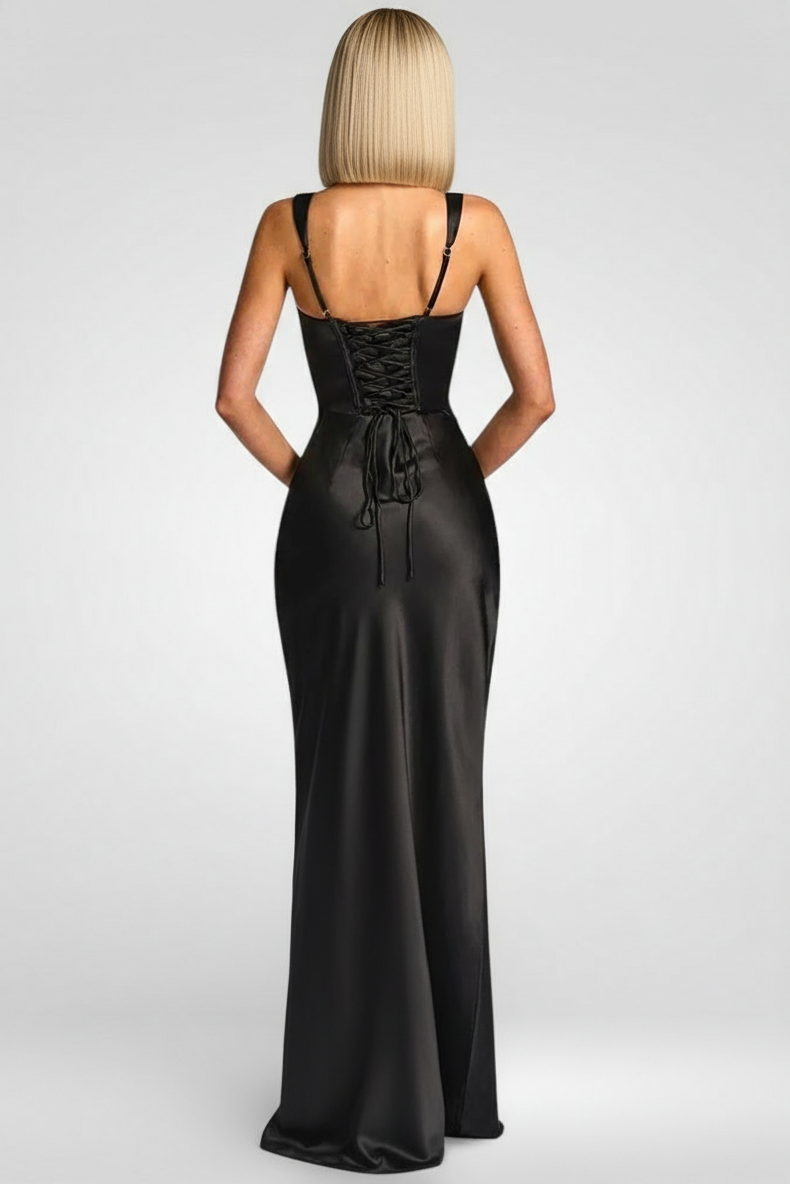 Black evening gown with lace-up back on a white background