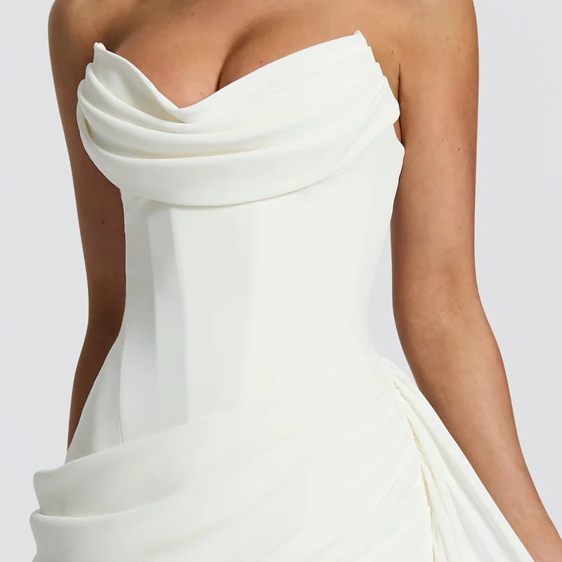 White strapless gown on a plain background