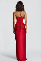 Red strapless gown on a white background